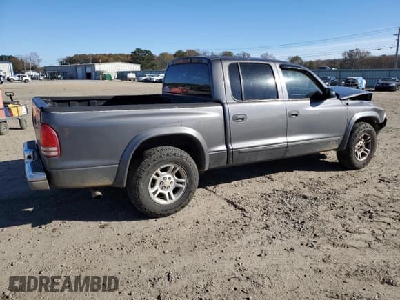 ✅ 2004 Dodge Dakota SLT • VIN: 1D7HL48NX4S579127 • Lot: 83688784. Wystawiony na Copart z przebiegiem 261 990 mil. Bezpłatny archiwum sprzedaży aukcyjnych z USA i szczegółowy raport historii pojazdu na DreamBid. Zdjęcie 3.