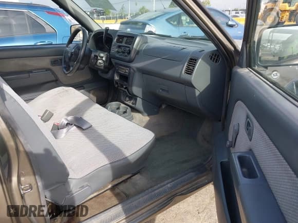 ✅ 2001 Nissan Frontier XE • VIN: 1N6DD21SX1C308632 • Lot: 42100901. Listed on IAAI with 150,600 mi. Free auction sales archive from the USA and detailed vehicle history report at DreamBid. Image 5.