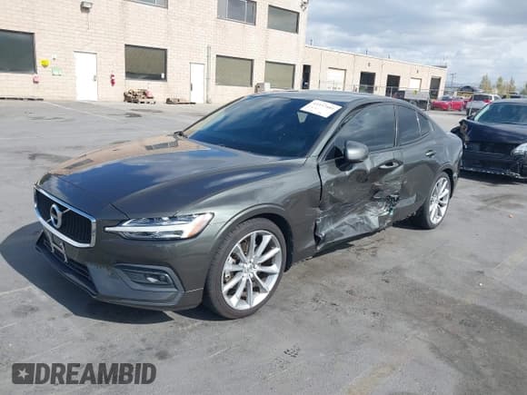✅ 2021 Volvo S60 Momentum • VIN: 7JR102FK5MG096604 • Lot: 43337481. Listed on IAAI with 77,100 mi. Free auction sales archive from the USA and detailed vehicle history report at DreamBid. Image 2.