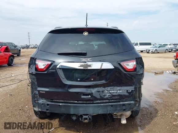 2015 Chevrolet Traverse LT z VIN 1GNKVHKDXFJ112775, wystawiony jako IAAI lot #43396691 z przebiegiem Nie podano mil oraz . Historia ofert i sprzedaży dostępna na DreamBid. Obrazek 17.