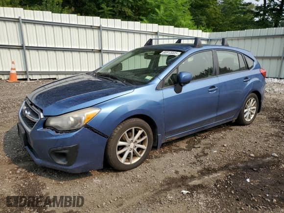 ✅ 2014 Subaru Impreza Premium • VIN: JF1GPAB6XEH311614 • Lot: 66913005. Listed on Copart with 170,635 mi. Free auction sales archive from the USA and detailed vehicle history report at DreamBid. Image 1.
