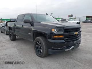 ✅ 2017 Chevrolet Silverado 1500 LT • VIN: 1GCUKREC2HF208232 • Lot: 40933445. Listed on IAAI with 105,928 mi. Free auction sales archive from the USA and detailed vehicle history report at DreamBid. Image 1.