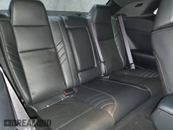 2021 Dodge Challenger z VIN NJ1659E, wystawiony jako Copart lot #42813565 z przebiegiem 28 061 mil mil oraz Szkoda całkowita • Salvage title. Historia ofert i sprzedaży dostępna na DreamBid. Obrazek 10.