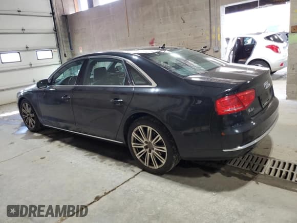 ✅ 2014 Audi A8 3.0T • VIN: WAURGAFD2EN011494 • Лот: 84004045. Опубликован ранее на Copart с пробегом 105 787 миль. Бесплатный доступ к архиву аукционных продаж из США и подробный отчёт об истории автомобиля на DreamBid. Изображение 2.
