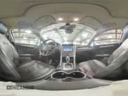 ✅ 2015 Ford Fusion Titanium • VIN: 3FA6P0SU8FR280559 • Lot: 70739355. Wystawiony na Copart z przebiegiem 148 456 mil. Bezpłatny archiwum sprzedaży aukcyjnych z USA i szczegółowy raport historii pojazdu na DreamBid. Zdjęcie 14.