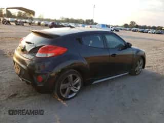 2013 Hyundai Veloster Turbo с VIN KMHTC6AE7DU171470, выставлен на аукционе Copart как лот 72215284 с пробегом 144 923 миль миль и Списание • Salvage title. История ставок и продаж доступна на DreamBid. Изображение 3.