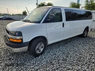 ✅ 2013 Chevrolet Express Passenger LT • VIN: 1GAZG1FG1D1153959 • Lot: 66517065. Listed on Copart with 124,956 mi. Free auction sales archive from the USA and detailed vehicle history report at DreamBid. Image 1.