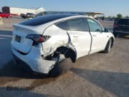 ✅ 2024 Tesla Model Y Long Range • VIN: 7SAYGDEE9RA289890 • Lot: 43502051. Wystawiony na IAAI z przebiegiem 16 169 mil. Bezpłatny archiwum sprzedaży aukcyjnych z USA i szczegółowy raport historii pojazdu na DreamBid. Zdjęcie 6.