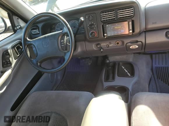 1999 Dodge Dakota SLT z VIN 1B7GG22X8XS105819, wystawiony jako Copart lot #84219405 z przebiegiem 130 962 mil mil oraz Szkoda całkowita • Salvage title. Historia ofert i sprzedaży dostępna na DreamBid. Obrazek 8.