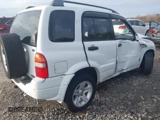 ✅ 2001 Suzuki Grand Vitara • VIN: JS3TE62V214154487 • Лот: 41116104. Опубликован ранее на IAAI с пробегом Не указан. Бесплатный доступ к архиву аукционных продаж из США и подробный отчёт об истории автомобиля на DreamBid. Изображение 4.