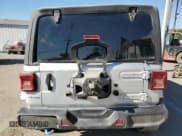 ✅ 2023 Jeep Wrangler Sahara • VIN: 1C4JJXP60PW689291 • Lot: 81000384. Listed on Copart with 9,028 mi. Free auction sales archive from the USA and detailed vehicle history report at DreamBid. Image 6.