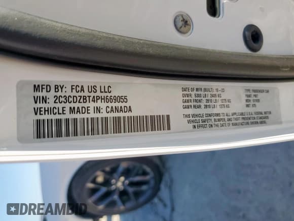 ✅ 2023 Dodge Challenger R/T • VIN: 2C3CDZBT4PH669055 • Lot: 86478475. Listed on Copart with 9,696 mi. Free auction sales archive from the USA and detailed vehicle history report at DreamBid. Image 13.