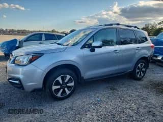 2017 Subaru Forester Limited with VIN JF2SJARC4HH510116, listed as a Copart auction lot 82122265 with 87,527 mi miles and Salvage title. Bid and sale history available at DreamBid. Image 1.