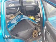 ✅ 2009 Chevrolet Aveo 1LT • VIN: KL1TD66E29B359012 • Lot: 41944884. Wystawiony na IAAI z przebiegiem 126 014 mil. Bezpłatny archiwum sprzedaży aukcyjnych z USA i szczegółowy raport historii pojazdu na DreamBid. Zdjęcie 8.