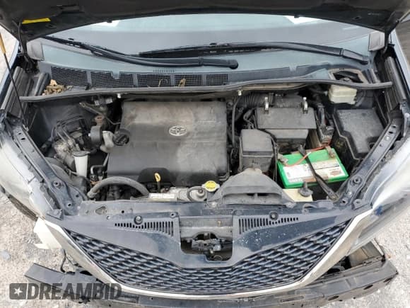 ✅ 2015 Toyota Sienna SE • VIN: 5TDXK3DC1FS532474 • Lot: 91856905. Listed on Copart with 215,019 mi. Free auction sales archive from the USA and detailed vehicle history report at DreamBid. Image 12.