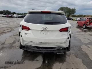 ✅ 2018 Hyundai Santa Fe 2.4L • VIN: 5XYZU3LB9JG531249 • Лот: 64804203. Опубликован ранее на Copart с пробегом 36 522 миль. Бесплатный доступ к архиву аукционных продаж из США и подробный отчёт об истории автомобиля на DreamBid. Изображение 6.