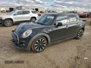 ✅ 2016 MINI Hardtop 4 Door • VIN: WMWXU1C52G2D57646 • Lot: 93259785. Wystawiony na Copart z przebiegiem 64 109 mil. Bezpłatny archiwum sprzedaży aukcyjnych z USA i szczegółowy raport historii pojazdu na DreamBid. Zdjęcie 1.