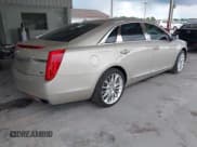 ✅ 2014 Cadillac XTS Platinum • VIN: 2G61S5S39E9222460 • Lot: 42602721. Listed on IAAI with 102,378 mi. Free auction sales archive from the USA and detailed vehicle history report at DreamBid. Image 4.