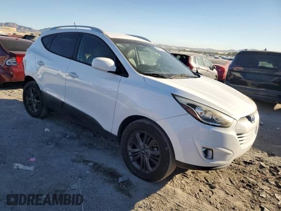 2015 Hyundai Tucson Limited with VIN KM8JUCAG9FU008424, listed as a Copart auction lot 90071535 with 142,268 mi miles and Salvage title. Bid and sale history available at DreamBid. Image 4.