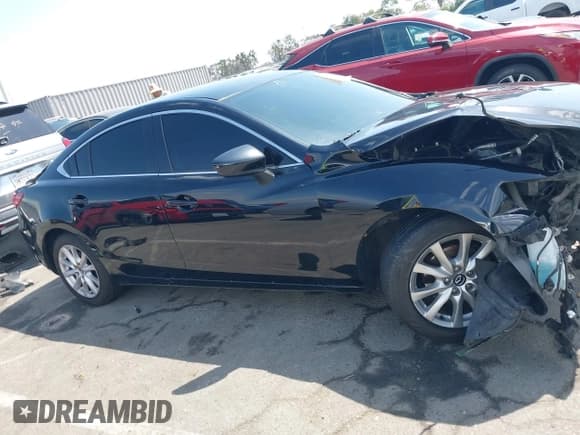 ✅ 2016 Mazda 6 i Sport • VIN: JM1GJ1U5XG1411286 • Lot: 43061615. Wystawiony na IAAI z przebiegiem 116 723 mil. Bezpłatny archiwum sprzedaży aukcyjnych z USA i szczegółowy raport historii pojazdu na DreamBid. Zdjęcie 13.