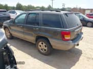 ✅ 1999 Jeep Grand Cherokee Laredo • VIN: 1J4GW58S3XC577091 • Lot: 42398194. Listed on IAAI with 270,812 mi. Free auction sales archive from the USA and detailed vehicle history report at DreamBid. Image 3.