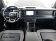 ✅ 2023 Ford Bronco • VIN: 1FMEE5DH2PLB21489 • Lot: 69743565. Listed on Copart with 14,326 mi. Free auction sales archive from the USA and detailed vehicle history report at DreamBid. Image 8.