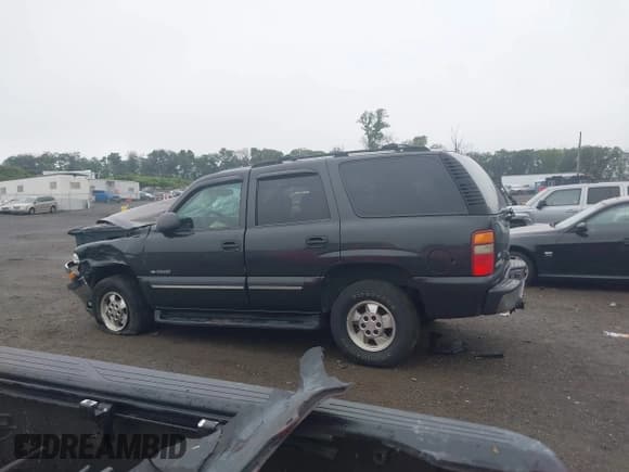 ✅ 2003 Chevrolet Tahoe LS • VIN: 1GNEC13V83R199980 • Lot: 42524928. Listed on IAAI with 152,769 mi. Free auction sales archive from the USA and detailed vehicle history report at DreamBid. Image 14.