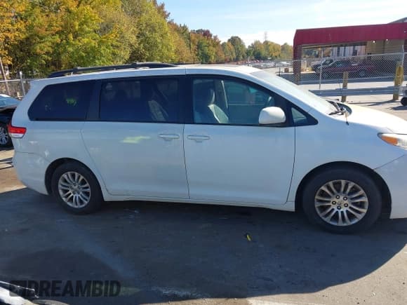 ✅ 2011 Toyota Sienna XLE • VIN: 5TDYK3DC7BS120249 • Lot: 43545371. Listed on IAAI with 175,936 mi. Free auction sales archive from the USA and detailed vehicle history report at DreamBid. Image 13.