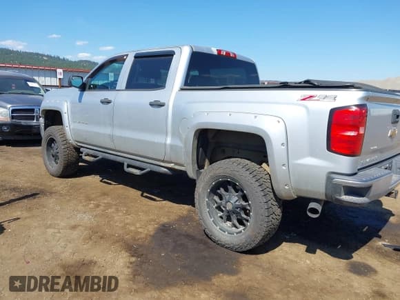 ✅ 2014 Chevrolet Silverado 1500 LT • VIN: 3GCUKREC1EG427970 • Лот: 42654486. Опубликован ранее на IAAI с пробегом 155 612 миль. Бесплатный доступ к архиву аукционных продаж из США и подробный отчёт об истории автомобиля на DreamBid. Изображение 3.