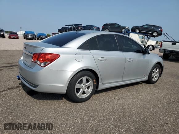 ✅ 2013 Chevrolet Cruze 1LT • VIN: 1G1PD5SB6D7237063 • Lot: 71249225. Listed on Copart with 107,590 mi. Free auction sales archive from the USA and detailed vehicle history report at DreamBid. Image 3.