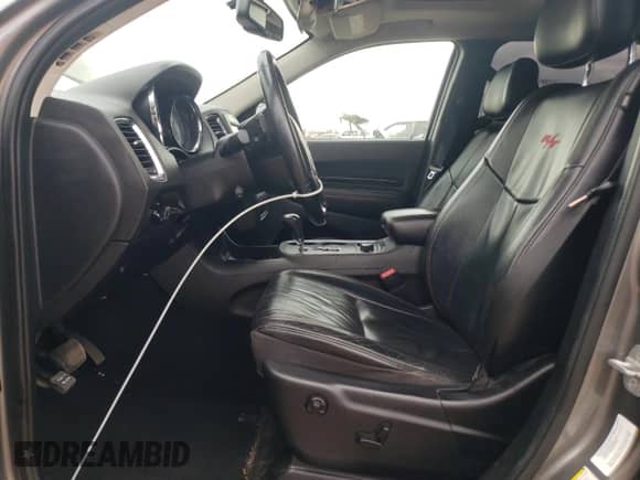 2012 Dodge Durango R/T with VIN 1C4SDJCT2CC147237, listed as a Copart auction lot 82385265 with 174,990 mi miles and Salvage title. Bid and sale history available at DreamBid. Image 7.