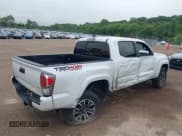 ✅ 2022 Toyota Tacoma SR • VIN: 3TYCZ5AN6NT062487 • Лот: 42591324. Опубликован ранее на IAAI с пробегом 61 129 миль. Бесплатный доступ к архиву аукционных продаж из США и подробный отчёт об истории автомобиля на DreamBid. Изображение 4.
