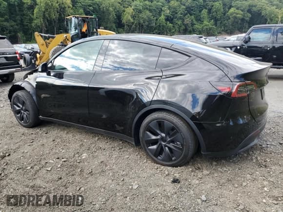 ✅ 2025 Tesla Model Y Long Range • VIN: 7SAYGDEE3SA352407 • Lot: 90881955. Wystawiony na Copart z przebiegiem 525 mil. Bezpłatny archiwum sprzedaży aukcyjnych z USA i szczegółowy raport historii pojazdu na DreamBid. Zdjęcie 2.