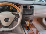 ✅ 2004 Cadillac XLR • VIN: 1G6YV34A945601816 • Lot: 50757205. Wystawiony na Copart z przebiegiem 182 078 mil. Bezpłatny archiwum sprzedaży aukcyjnych z USA i szczegółowy raport historii pojazdu na DreamBid. Zdjęcie 9.