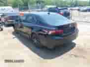 2021 Toyota Camry SE with VIN 4T1G11BK6MU036852, listed as a IAAI auction lot 42590115 with 79,752 mi miles and . Bid and sale history available at DreamBid. Image 3.