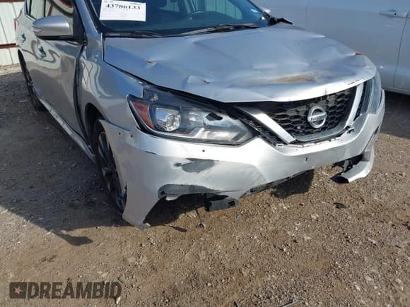 ✅ 2018 Nissan Sentra S • VIN: 3N1AB7AP6JY313647 • Lot: 43786133. Wystawiony na IAAI z przebiegiem 135 065 mil. Bezpłatny archiwum sprzedaży aukcyjnych z USA i szczegółowy raport historii pojazdu na DreamBid. Zdjęcie 6.