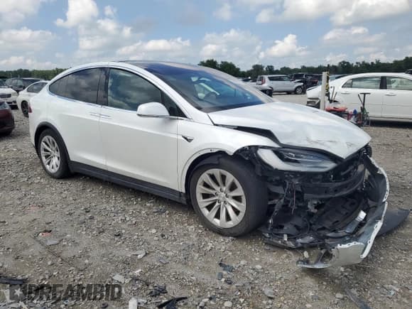 ✅ 2021 Tesla Model X Long Range Plus • VIN: 5YJXCDE26MF321930 • Lot: 64676215. Listed on Copart with 83,131 mi. Free auction sales archive from the USA and detailed vehicle history report at DreamBid. Image 4.