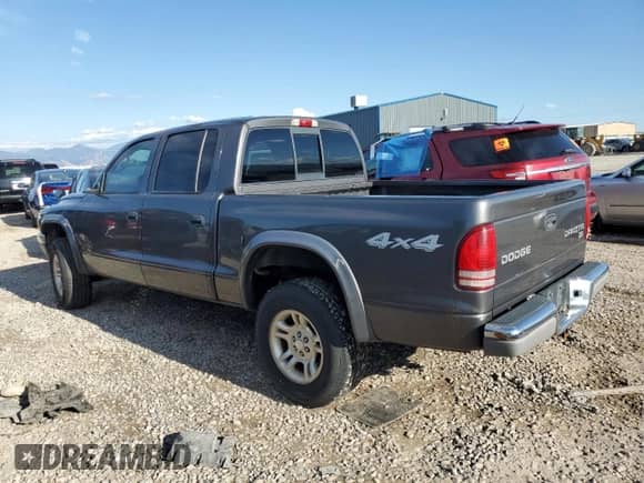 2004 Dodge Dakota SLT z VIN 1D7HG48N24S594161, wystawiony jako Copart lot #71238164 z przebiegiem Nie podano mil oraz Szkoda całkowita • Salvage title. Historia ofert i sprzedaży dostępna na DreamBid. Obrazek 2.