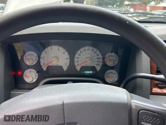 2006 Dodge 1500 Laramie z VIN 1D7HU18296S693897, wystawiony jako Copart lot #71752305 z przebiegiem 140 599 mil mil oraz Czysty tytuł • Clean title. Historia ofert i sprzedaży dostępna na DreamBid. Obrazek 8.