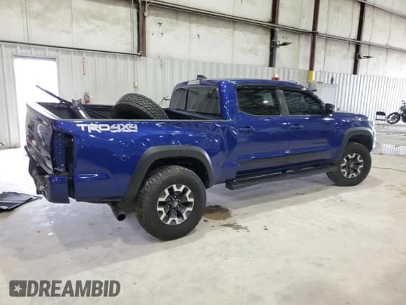 ✅ 2023 Toyota Tacoma TRD Off Road • VIN: 3TMDZ5BN5PM157057 • Лот: 92019985. Опубликован ранее на Copart с пробегом 29 530 миль. Бесплатный доступ к архиву аукционных продаж из США и подробный отчёт об истории автомобиля на DreamBid. Изображение 3.