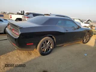✅ 2023 Dodge Challenger GT • VIN: 2C3CDZKG1PH670649 • Lot: 65275074. Wystawiony na Copart z przebiegiem 2 507 mil. Bezpłatny archiwum sprzedaży aukcyjnych z USA i szczegółowy raport historii pojazdu na DreamBid. Zdjęcie 3.
