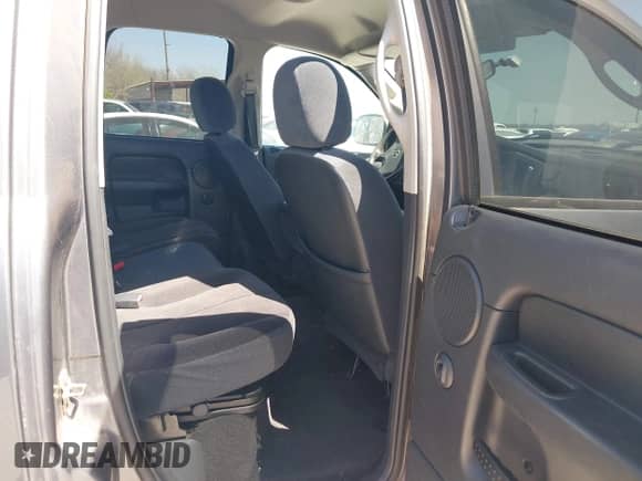 2003 Dodge 1500 ST z VIN 1D7HA18N13S360544, wystawiony jako IAAI lot #41808387 z przebiegiem 169 785 mil mil oraz . Historia ofert i sprzedaży dostępna na DreamBid. Obrazek 8.