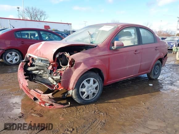 2011 Chevrolet Aveo 1LT z VIN KL1TD5DE5BB134392, wystawiony jako IAAI lot #41352555 z przebiegiem 153 160 mil mil oraz . Historia ofert i sprzedaży dostępna na DreamBid. Obrazek 18.