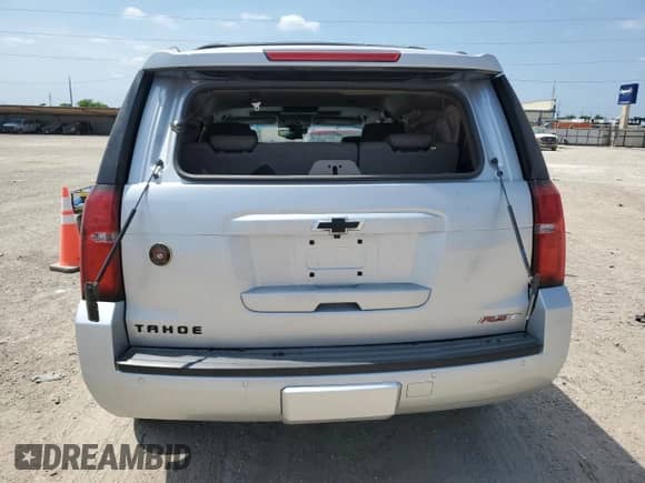 2019 Chevrolet Tahoe Premier z VIN 1GNSKCKJ3KR295868, wystawiony jako Copart lot #53320585 z przebiegiem 90 370 mil mil oraz Szkoda całkowita • Salvage title. Historia ofert i sprzedaży dostępna na DreamBid. Obrazek 6.