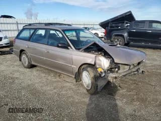 ✅ 1999 Subaru Legacy L • VIN: 4S3BK4354X6303601 • Lot: 81712344. Listed on Copart with 169,733 mi. Free auction sales archive from the USA and detailed vehicle history report at DreamBid. Image 4.
