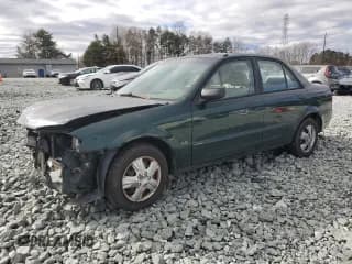 ✅ 2000 Mazda Protege DX • VIN: JM1BJ2228Y0288605 • Lot: 47955035. Wystawiony na Copart z przebiegiem 332 394 mil. Bezpłatny archiwum sprzedaży aukcyjnych z USA i szczegółowy raport historii pojazdu na DreamBid. Zdjęcie 1.