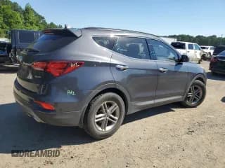 ✅ 2018 Hyundai Santa Fe 2.4L • VIN: 5XYZU3LB6JG522640 • Лот: 59038864. Опубликован ранее на Copart с пробегом 82 372 миль. Бесплатный доступ к архиву аукционных продаж из США и подробный отчёт об истории автомобиля на DreamBid. Изображение 3.
