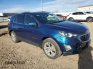 ✅ 2020 Chevrolet Equinox LT • VIN: 2GNAXUEV8L6203359 • Lot: 82624715. Listed on Copart with 79,825 mi. Free auction sales archive from the USA and detailed vehicle history report at DreamBid. Image 4.