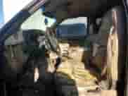 2001 Dodge 1500 z VIN 1B7HF13Z51J292550, wystawiony jako Copart lot #77139774 z przebiegiem 291 671 mil mil oraz Szkoda całkowita • Salvage title. Historia ofert i sprzedaży dostępna na DreamBid. Obrazek 7.