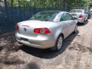 ✅ 2010 Volkswagen Eos Komfort • VIN: WVWBA7AH9AV015748 • Lot: 42786578. Listed on IAAI with 130,099 mi. Free auction sales archive from the USA and detailed vehicle history report at DreamBid. Image 4.